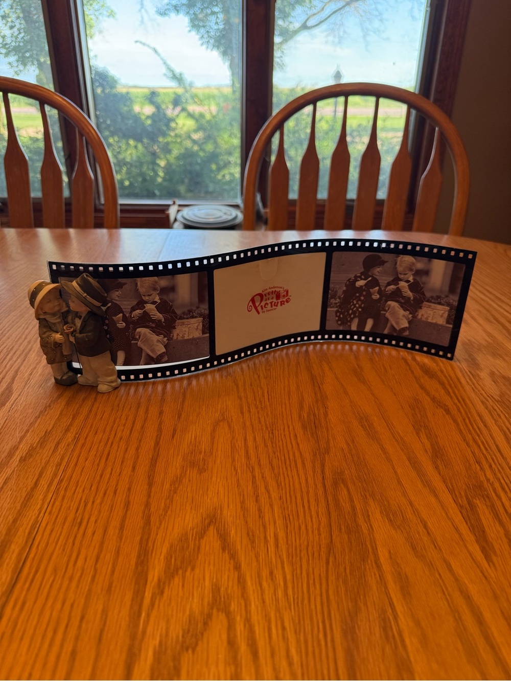 Vintage Black Filmstrip Photo Frame with Figurine Accent